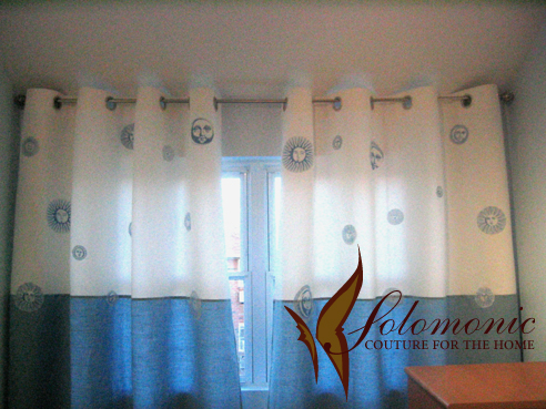 Appliqué Suns on Grommets Drapes.jpg